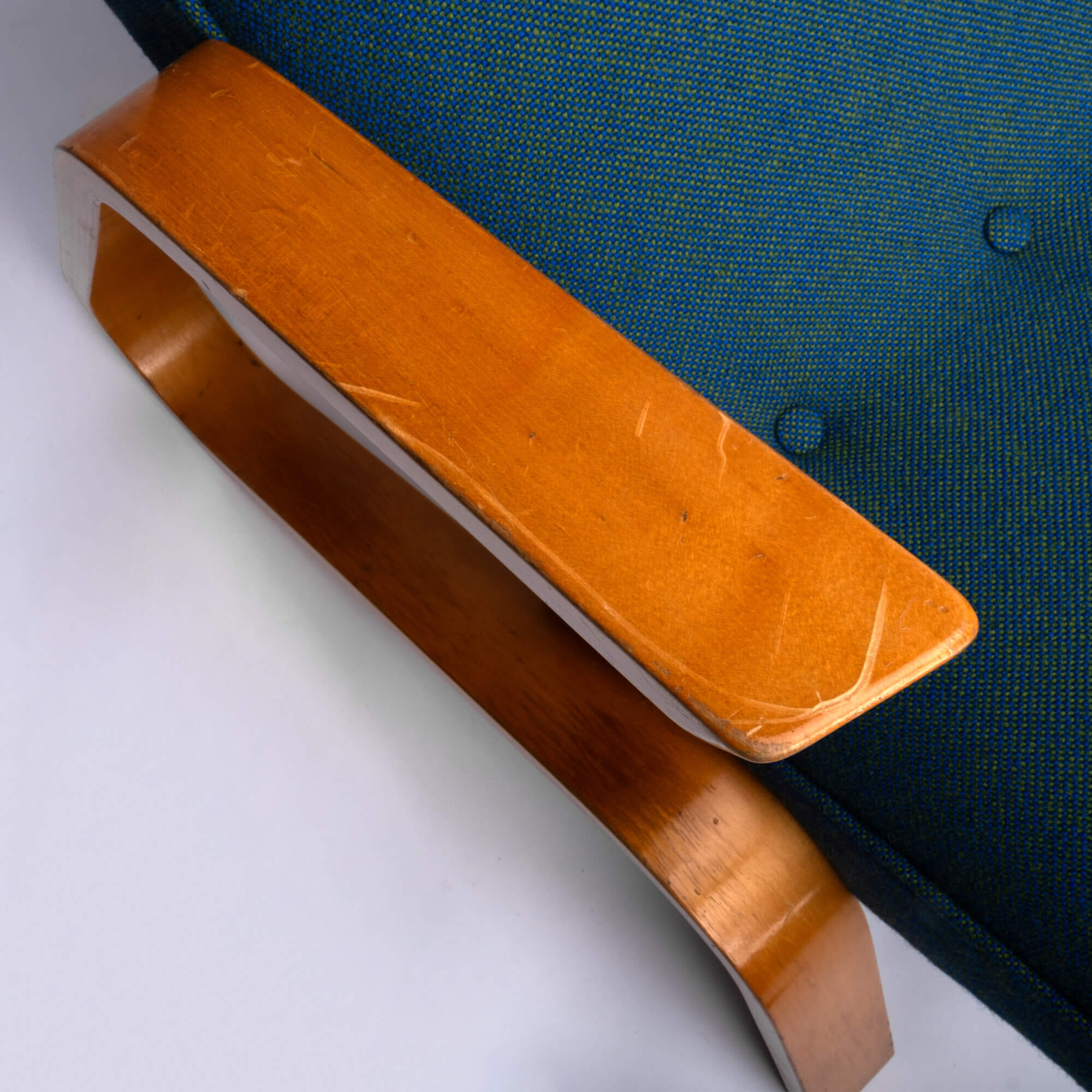 Eero Saarinen Grasshopper lounge chair close up from armrest
